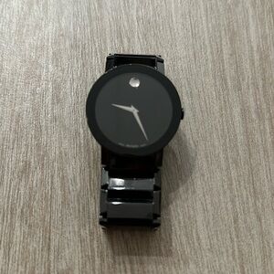 Movado watches ceramic super stylish. Used couple times. Looks brand new.